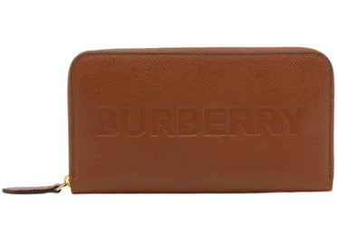 Portefeuille zippé Burberry en cuir embossé couleur fauve