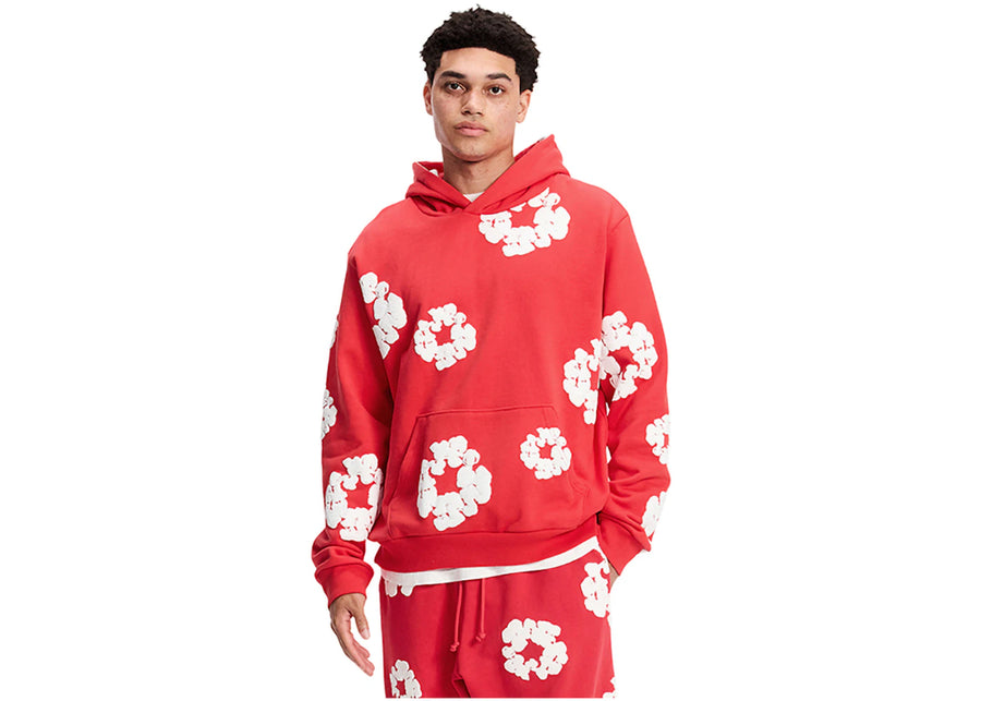 Sweat-shirt rouge à motif couronne en coton et déchirures de denim