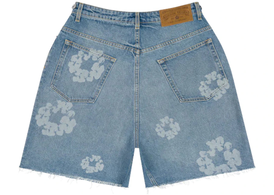 Short en jean bleu avec motif laser « Larmes de denim »