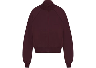 Veste de survêtement Nike x SKIMS pour femme, coloris groseille, finition mate tricot.