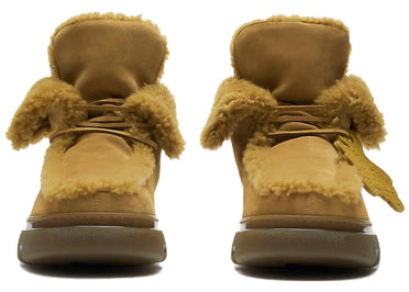 Bottines Burberry jaunes en daim ornées de peau lainée