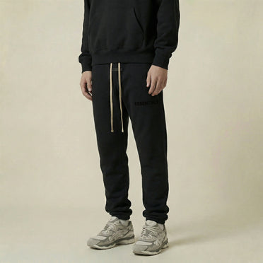 Pantalon de survêtement crème à cordon Fear Of God Essentials noir de jais