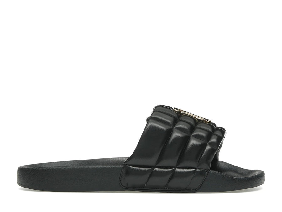 Mules Burberry en agneau matelassé à motif monogramme noir et or