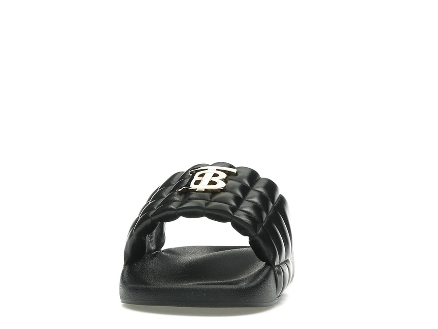 Mules Burberry en agneau matelassé à motif monogramme noir et or