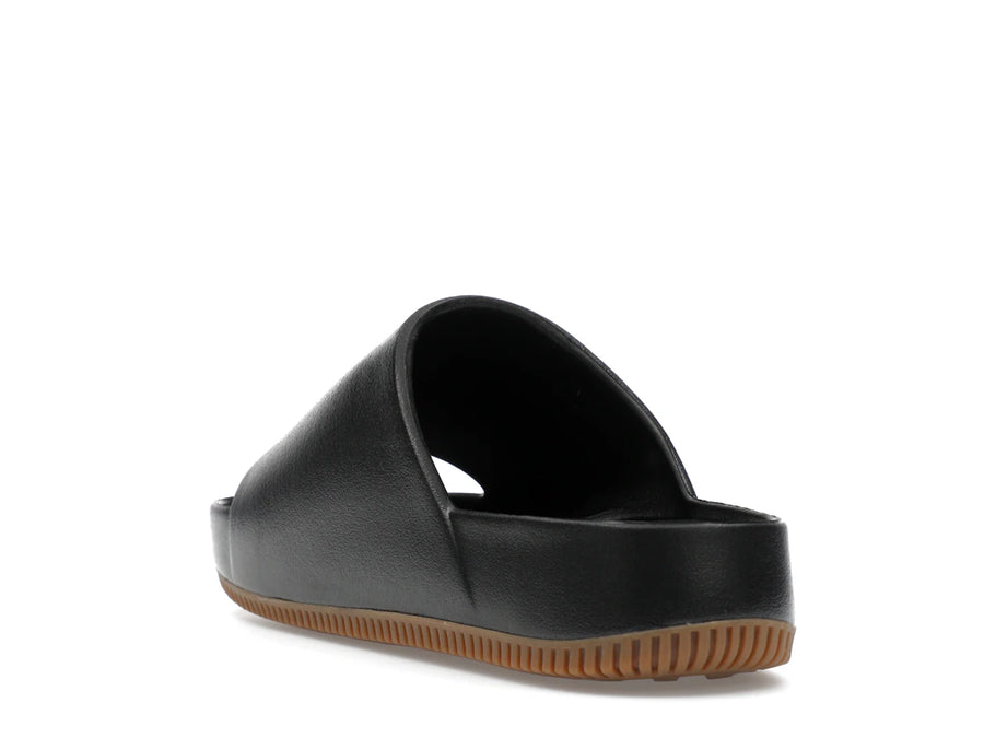 Claquettes Nike Calm noires en gomme